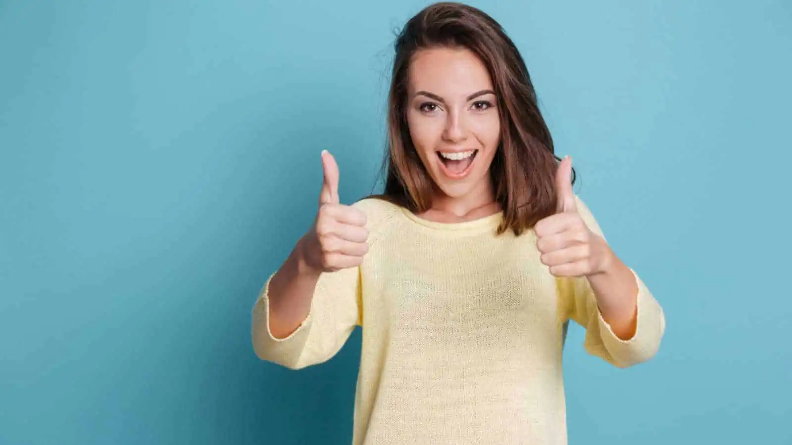 Woman showing thumbs up