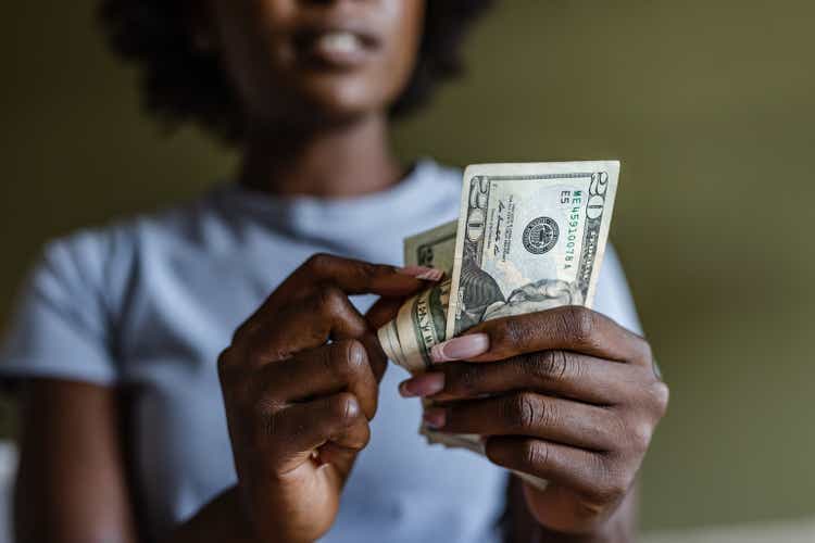 Close up of a woman counting money