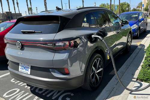 VW ID.4 plugged into a charging station