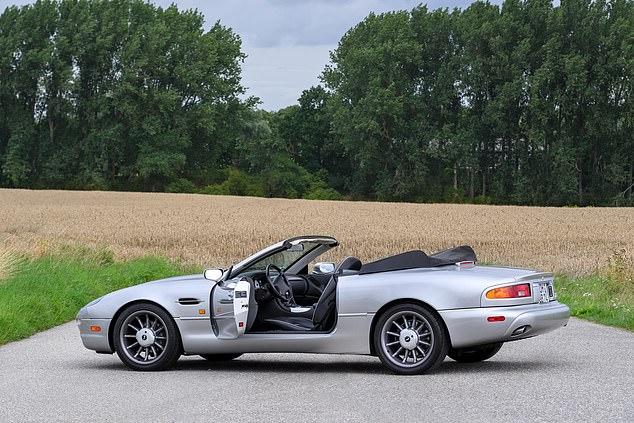 The 1998 Aston Martin DB7 Volante that features in the 90s music video is estimated to make £35,000 to £52,000
