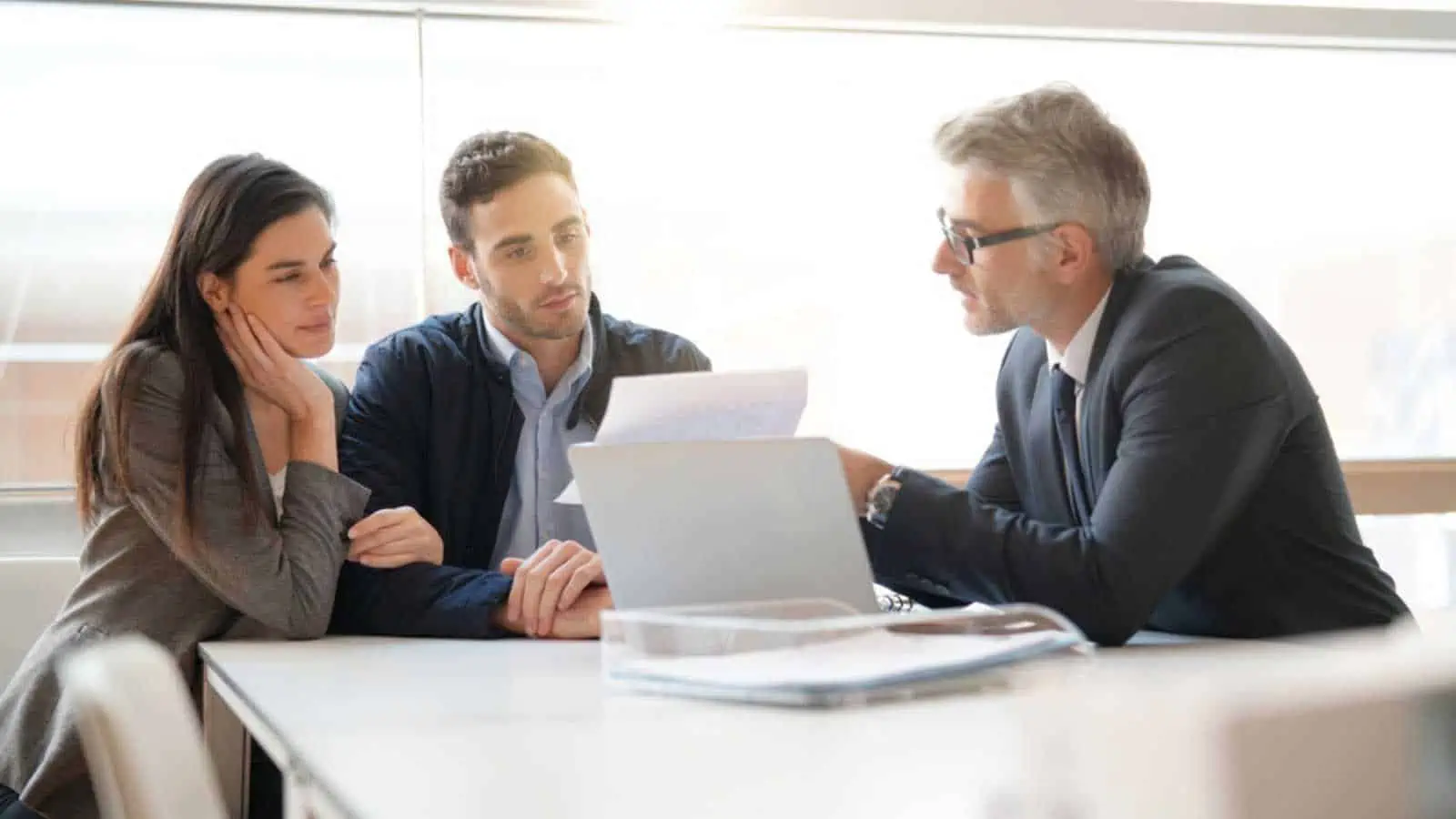 Couples getting advice from Financial Advisor