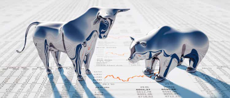 Silver Bull and Bear on Newspaper