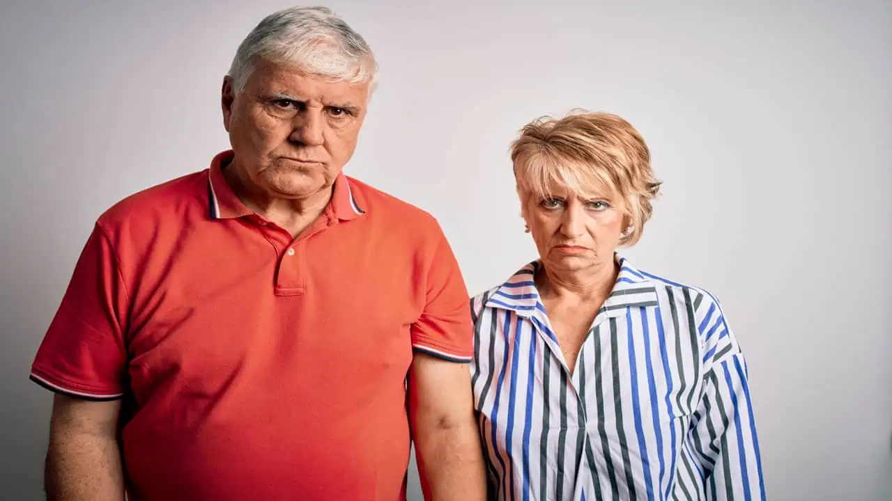 unhappy retired couple