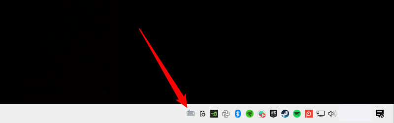 The unlocked keyboard icon on the taskbar. 