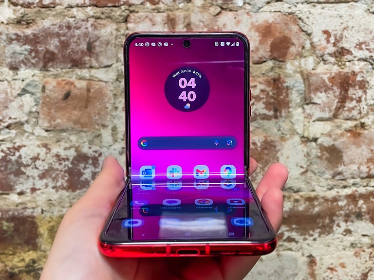 The new Motorola Razr Plus being shown against a brick will