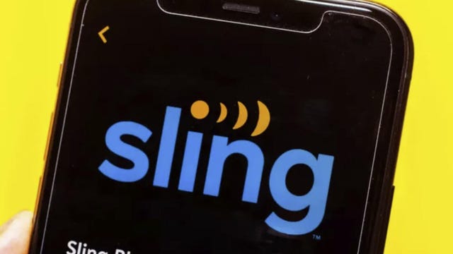 A cellphone displays the Sling TV logo.