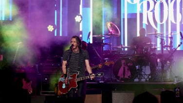 rick springfield performing at epcot garden rocks concert