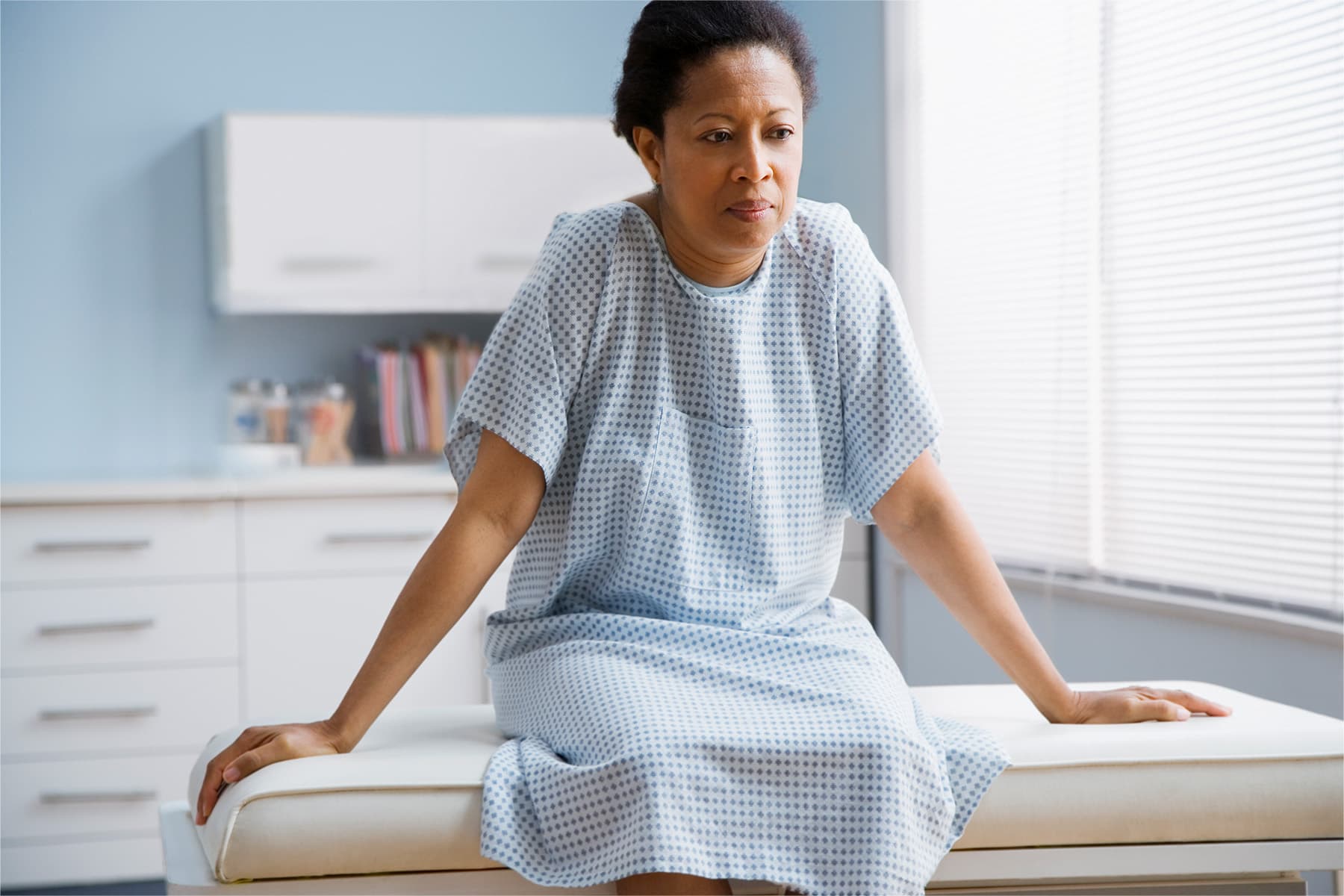 photo of woman on exam table