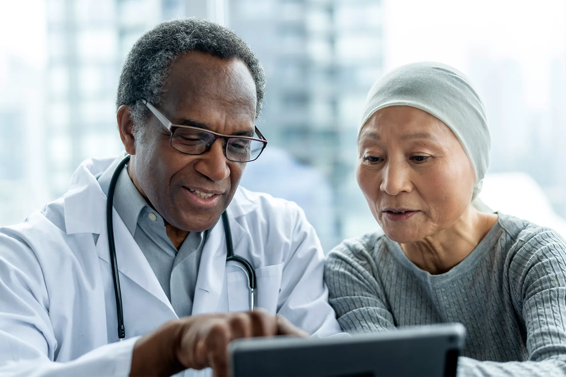 photo of doctor reviewing test result with patient