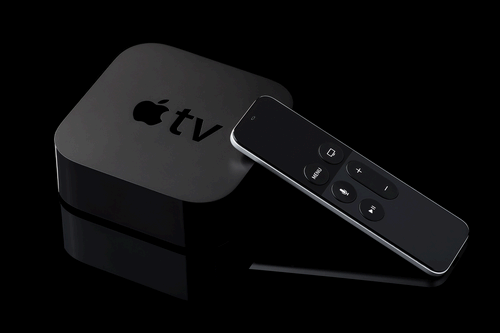 Apple TV device on a black background.