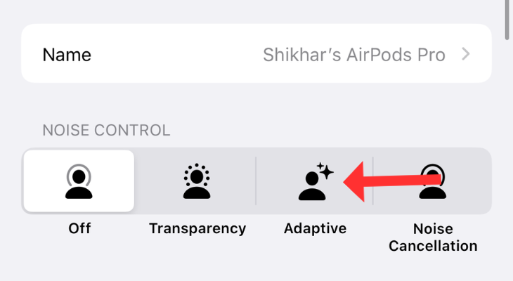 AirPods settings menu with an arrow next to Adaptive Audio