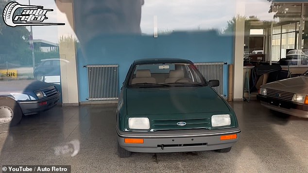 Inside are three entry spec Ford Fiestas, including one estate (the blue model seen on the left) and this pristine green hatchback