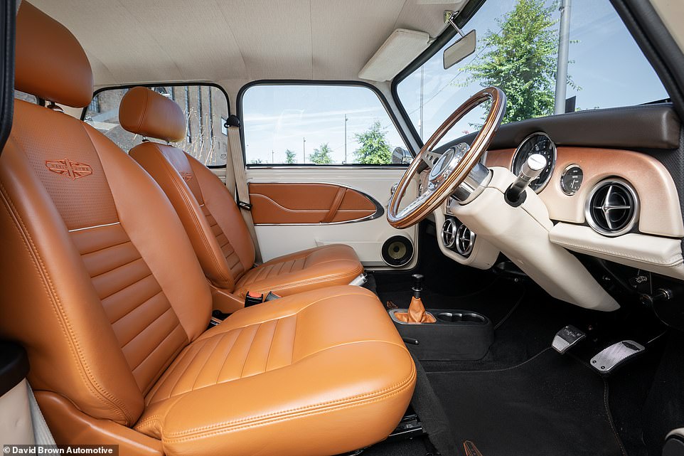 The seats, door inserts and dash now feature high-grade materials, with the David Brown Automotive logo embossed into the chairs