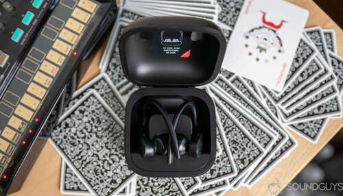 Beats Powerbeats Pro in charging case, aerial view.