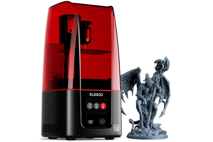 A detailed 3D object sits beside the Elegoo Mars 4 9K UV resin 3D printer.