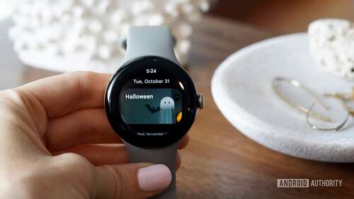 A Google Pixel Watch 2 displays the calendar app.