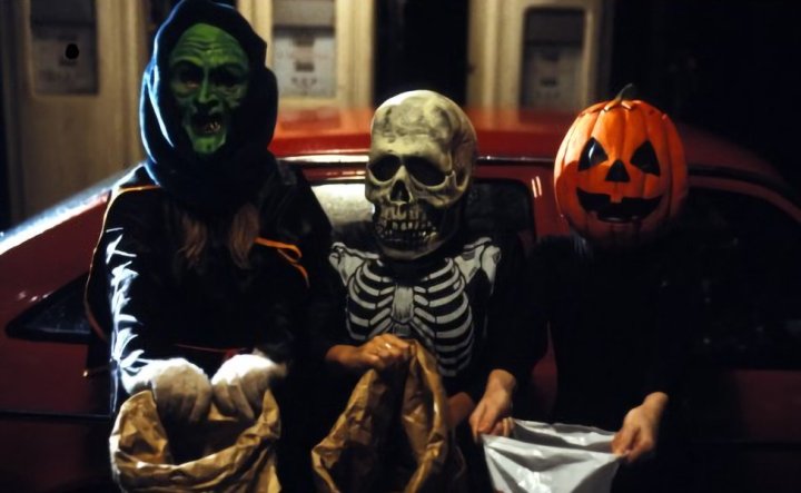 Children wearing the witch, skeleton, and jack o'lantern masks in Halloween III