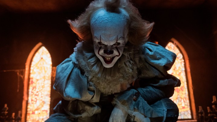 Bill Skarsgård as the monstrous clown monster Pennywise in It.