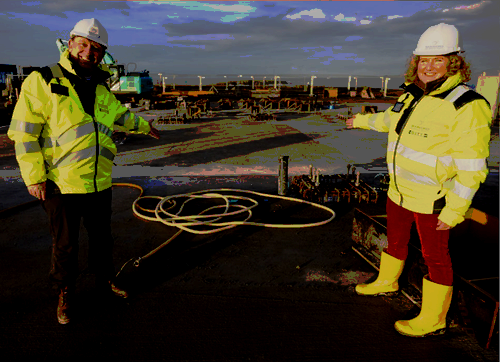 SaxaVord Spaceport Deputy CEO Scott Hammond (left) and COO Debbie Strang at the launch site stool base.