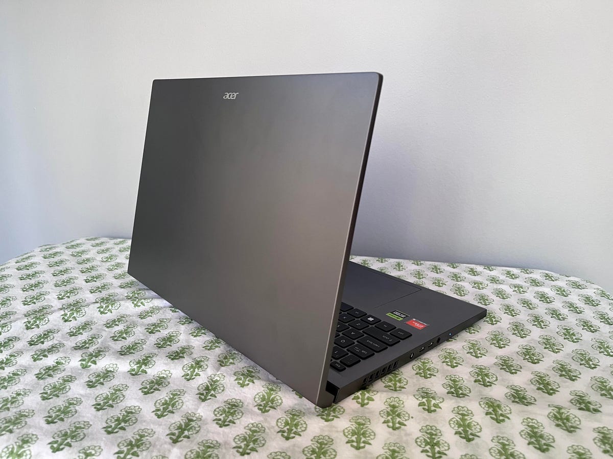 Acer Swift X 16 all-metal body on a green table covering