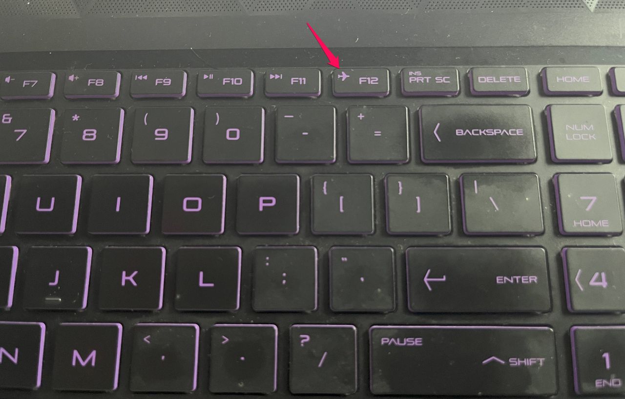 The airplane mode key on a laptop keyboard