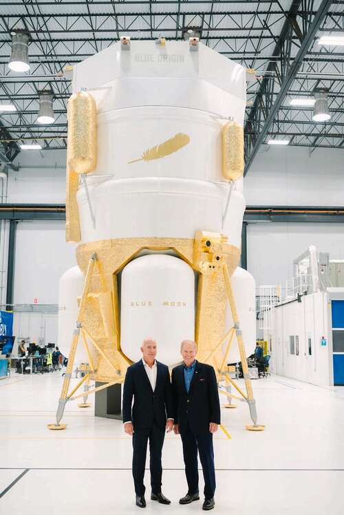 Blue Origin founder Jeff Bezos with NASA boss Bill Nelson in front of a mock-up of the Blue Moon lunar lander.