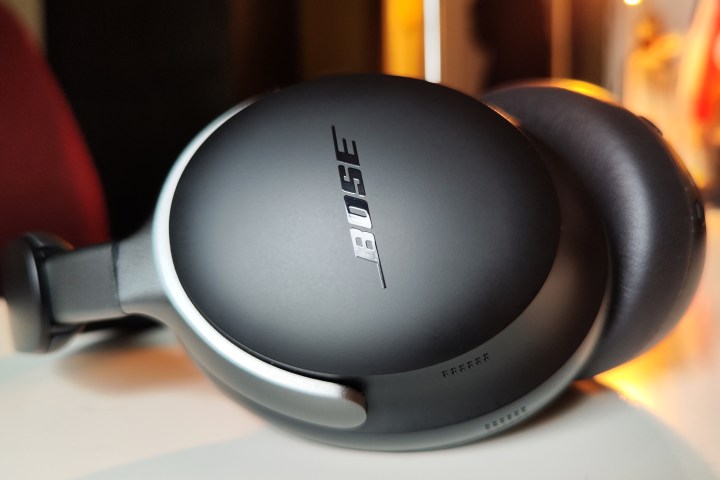 Bose QuietComfort Ultra Headphones: Earcup/logo close-up.