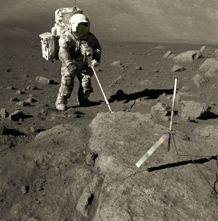 Apollo 17 astronaut Harrison Schmitt collects a sample from the Moon in 1972