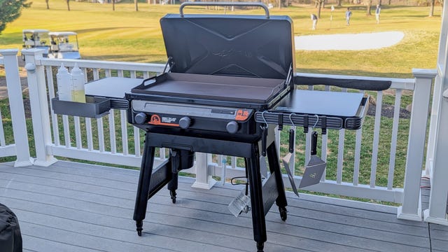 Flat top griddle with golfers in the background