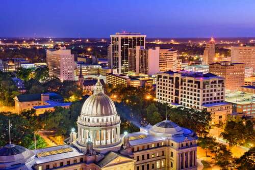 View of Jackson Mississippi skyline at night.