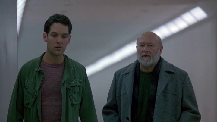 Paul Rudd and Donald Pleasance walk through a hospital hallway in Halloween: The Curse of Michael Myers