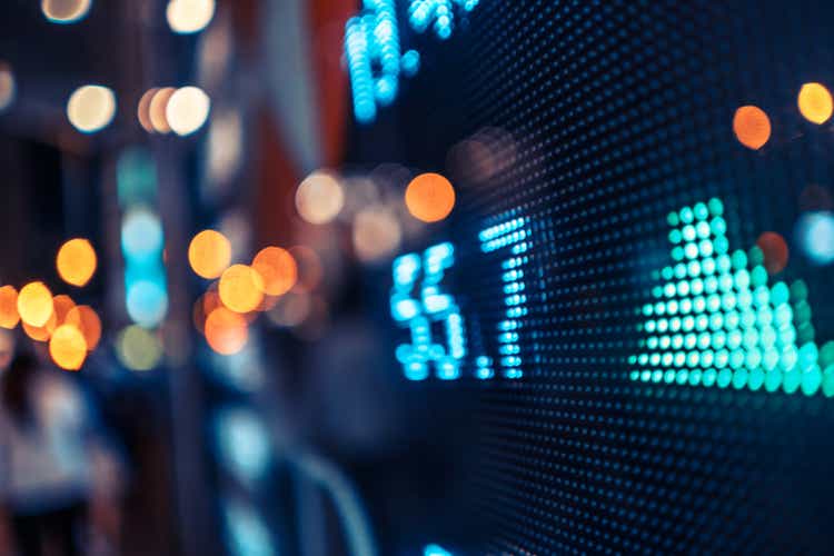 Financial stock exchange market display screen board on the street, selective focus