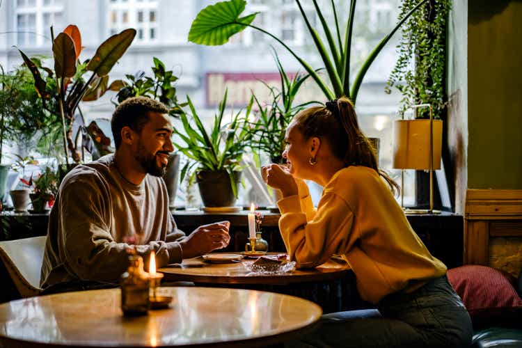 Couple on a weekend date at cute cafe