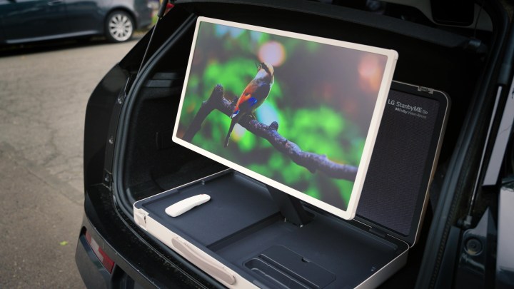 A LG StanbyMe Go set up in the trunk of a car. 