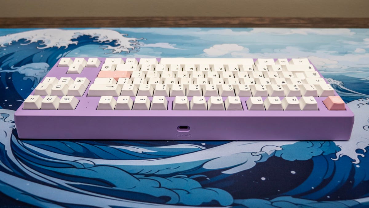 The rear of the Monokei Standard mechanical keyboard in lilac with white keycaps.