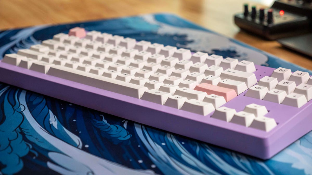 Monokei Standard mechanical keyboard in lilac with white keycaps.