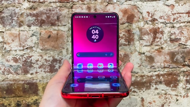 The new Motorola Razr Plus being shown against a brick will