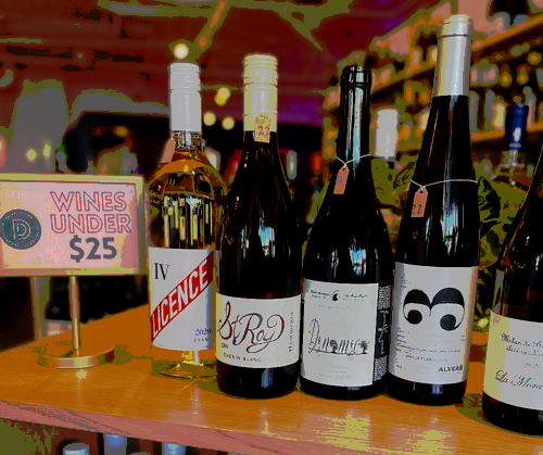 bottles of wine under $25 on table