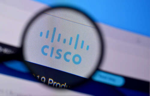 Homepage of cisco website on the display of PC.