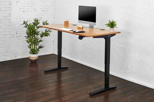 UPLIFT Standing Desk V2 Lifestyle with iMac and other items