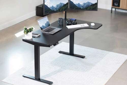 VIVO L-Shaped Standing Desk with computers and accessories on top