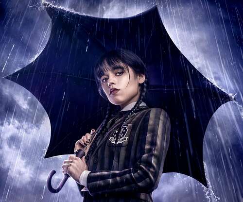 jenna ortega as wednesday addams holds a black umbrella over herself