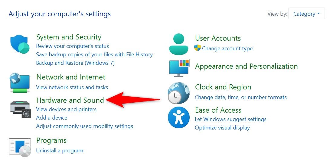 'Hardware and Sound' highlighted in Control Panel.