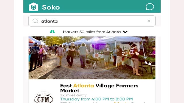 soko app displaying outdoor farmers market with people and stands