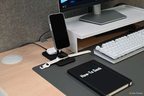 Twelve South HiRise 3 Deluxe on a desk with iPhone in portrait orientation 