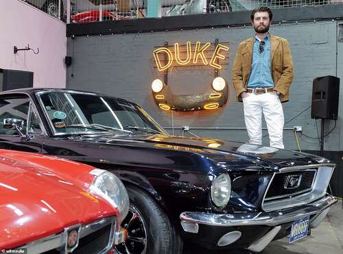 Mr McCormack, pictured, with a Ford Mustang said potential classic car owners should by the best vehicle they can afford as the cheaper ones will require considerably more work to keep on the road... unless they are looking for a project