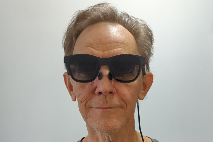 Alan Truly wears the Xreal Air 2 smart glasses.