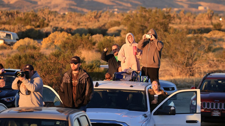 Crowd watches B-21 test flight