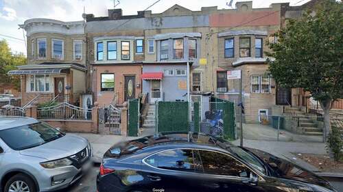 Forbell Street townhouse with red awning