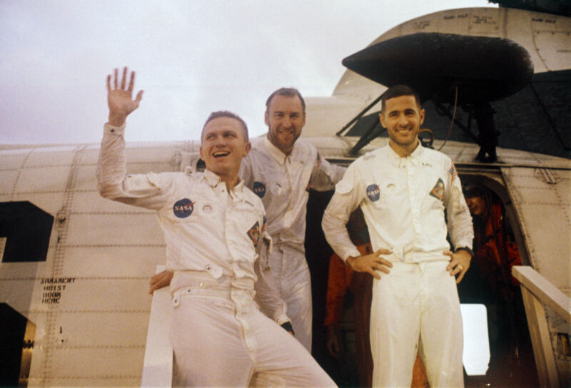 NASA astronauts Frank Borman, Jim Lovell, and Bill Anders wave to onlookers aboard the USS <em>Yorktown</em> after splashdown to end the Apollo 8 mission to the Moon.